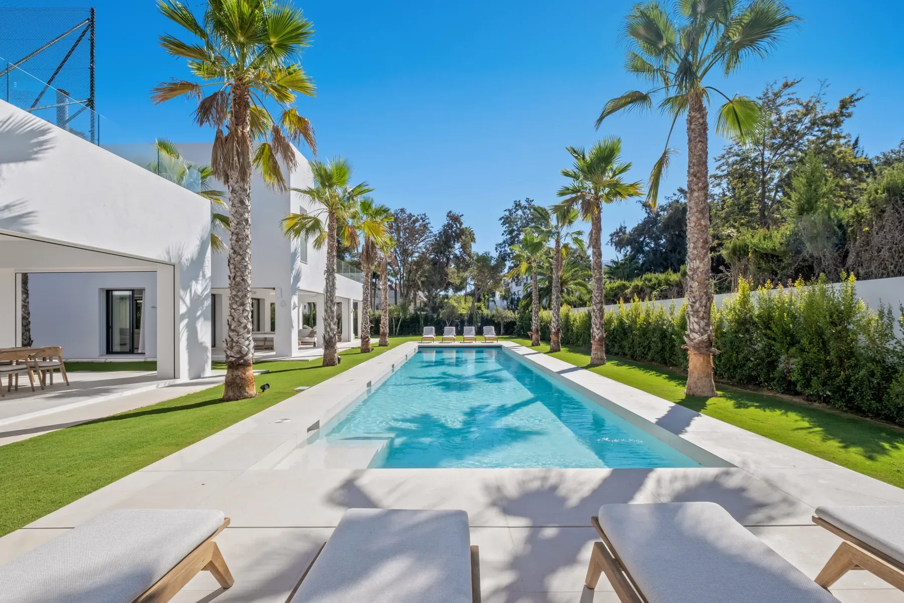 Villa Byblos heated 18m private swimming pool lined with palm trees and sun loungers